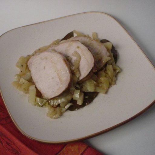 Lomo De Cerdo Asado Al Horno En Cacerola Tapada, Con Vino Blanco, Ajos Y Romero