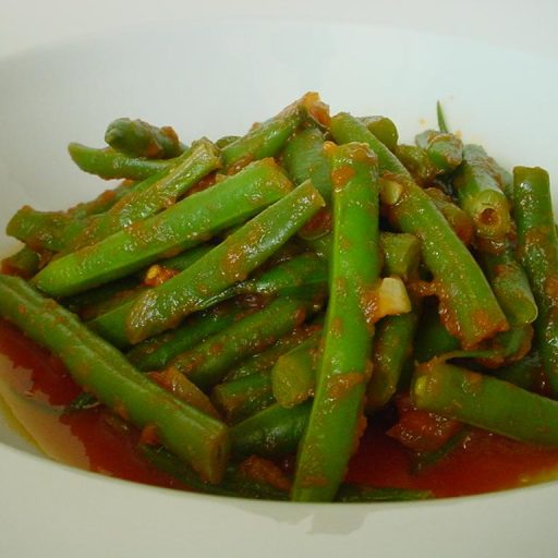 Habichuelas Cocinadas En Jugo De Tomate